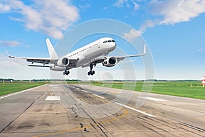Passenger plane lands on runway at airport