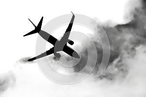 Passenger plane passing through the clouds