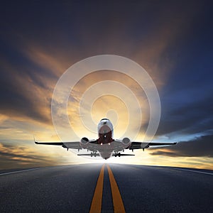 Passenger plane take off from runways against beautiful dusky sk