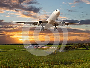 Passenger plane takes off from the airport runway.