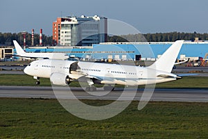 Passenger plane takes off from the airport runway