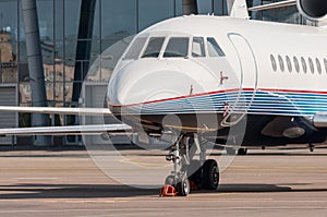Passenger planes at the airport. Pilot cabine close-upview photo