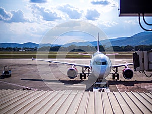 Passenger planes at the airport, view through window