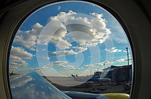 Passenger planes at the airport, view through window photo