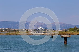 Passenger`s airplane is landing at Kerkyra Airport.