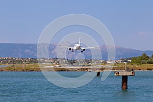 Passenger`s airplane is landing at Kerkyra Airport.