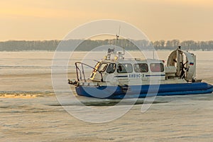 Passenger ship with an air cushion `Khivus` on the ice of the Volga River in Samara. Russian text: Khivus