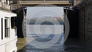 Passenger ship in water chamber Lock on River Danube in Melk, Austria