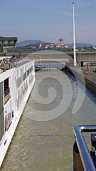 Passenger ship in water chamber Lock on River Danube in Melk, Austria