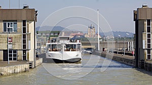 Passenger ship in water chamber Lock on River Danube in Melk, Austria