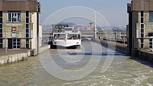 Passenger ship in water chamber Lock on River Danube in Melk, Austria