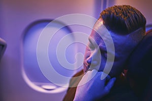 Passenger sleeping during night flight