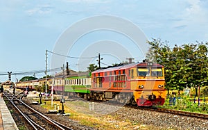 Passenger train for Bangkok departs from Ayutthaya station