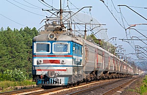 Passenger train hauled by electric locomotive