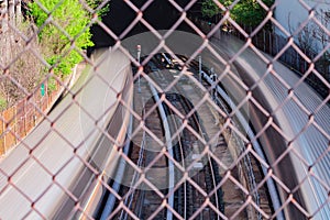 Passenger train moving quickly into underground tunnel