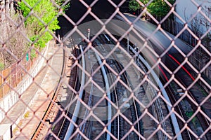 Passenger train moving quickly into underground tunnel