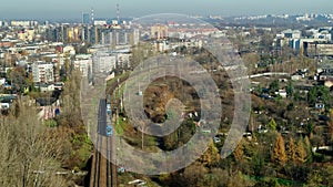 Passenger Train Ride On a City View - AERIAL