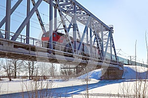 Passenger Train rides on the railway bridge