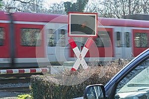 Passenger train transit at the railroad crossing