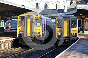 Passenger trains at Carnforth station.