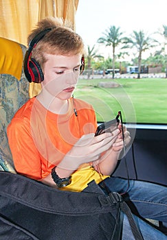 Passenger traveler boy is traveling by bus.