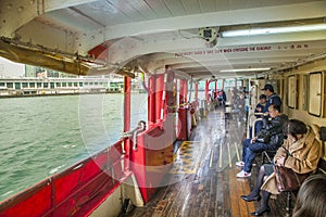Passenger on upper deck of a Star Ferry