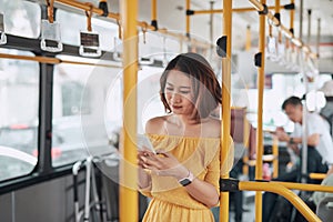 The passenger use smartphone in the bus or train, technology lifestyle, transportation and traveling concept