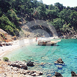 Passenger vessel waiting for tourists. Blue sea.