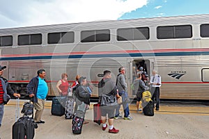 Passengers boarding an Amtrak train