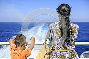 Passengers enjoying travel in a cruise ship