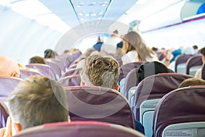 Passengers inside airplane