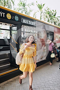 Passengers leave the city bus