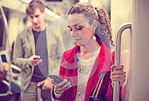 Passengers in metro wagon