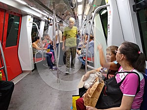 Passengers in subway train metro Caracas Venezuela