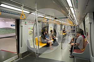 Passengers traveling on the subway in Singapore
