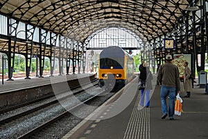 Passengers waiting for a train on the platform