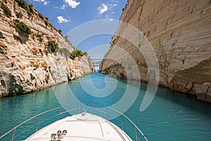 Passing through the Corinth Canal by yacht, Greece. The Corinth Canal connects the Gulf of Corinth with the Saronic Gulf