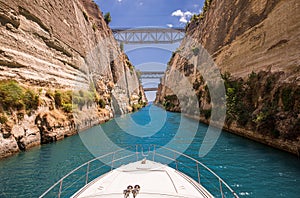 Passing through the Corinth Canal by yacht, Greece. The Corinth Canal connects the Gulf of Corinth with the Saronic Gulf