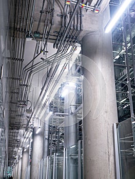 Passing daylight inside office building on modern glass building interior corridor