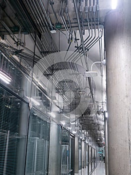 Passing daylight inside office building on modern glass building interior corridor