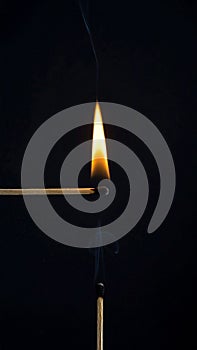 Passing the Flame from One Match to Another in the Dark