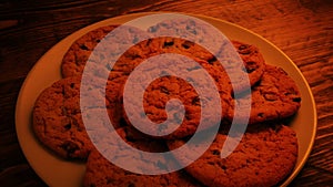 Passing Plate Of Cookies By Fireplace