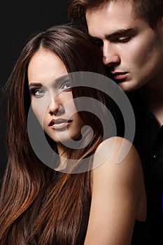 passion couple, beautiful young female and male faces close