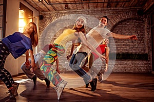 Passion dance team - urban hip hop dancer exercising dance train photo