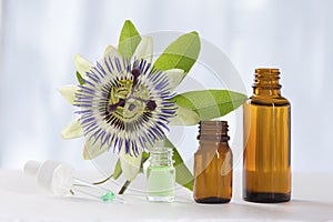 Passion flower with aromatherapy essential oil brown glass bottle