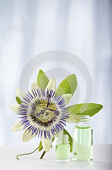 Passion flower with aromatherapy essential oil glass bottle