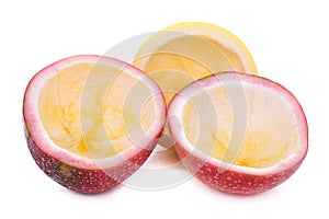 Passion fruit cut in half isolated on white background