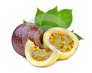 Passion fruit with green leaves isolated on white