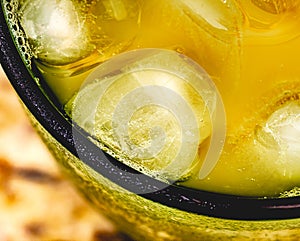 Passion fruit juice with several ice cubes. photo