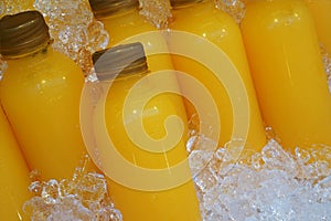 Passion fruit juicy juice bottles with cold ice half litre pa photo